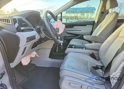 2023 Honda Odyssey Elite z USA, uszkodzony, nr VIN 5FNRL6H97PB004370